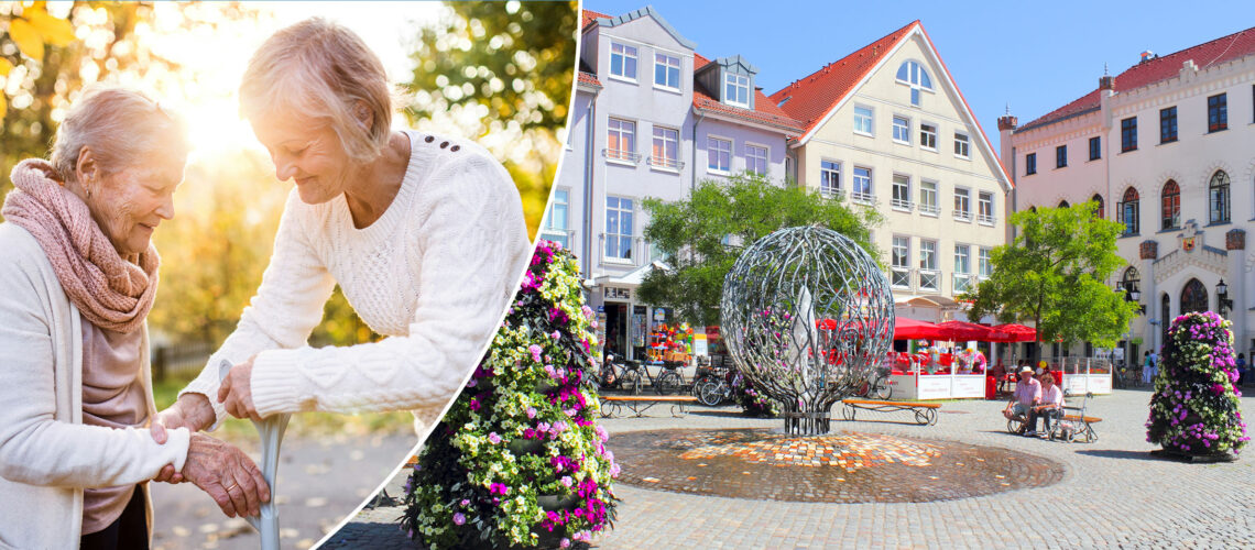 Ältere Frau stützt eine alte Dame. Stadtbild mit Springbrunnen.